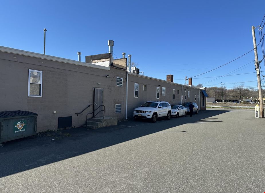 711 Broadway Industrial Trade Building with In-Place Dry Cleaner Income