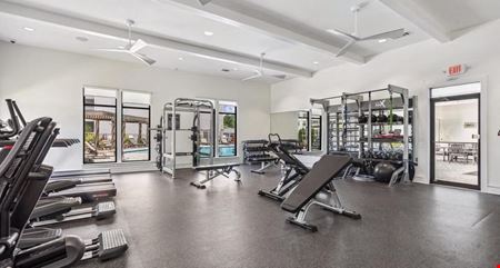100% of the Limited Liability Company Membership Interests in the Entities that Own the Ansley Park, NC Apartment Complex
