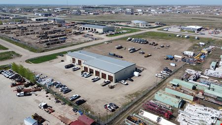±14,000 SF Industrial Shop | ±6.63 Fenced Yard | Williston ND