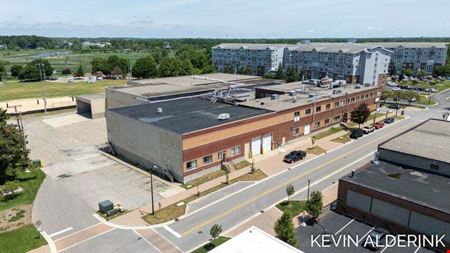 Located in the Heart of Downtown Holland Overlooking Window on the Waterfront