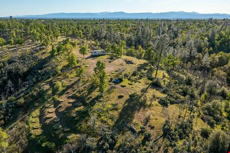 ±40.29 Acres of Level Land w/ ±1,400 SF of Structures