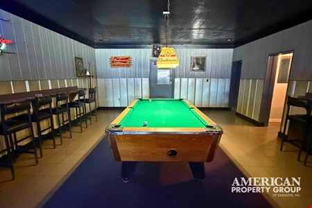 High-Visibility Freestanding Bar Property