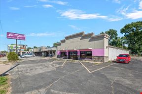 Retail Property with Open Showroom Near Hy-Vee For Sale