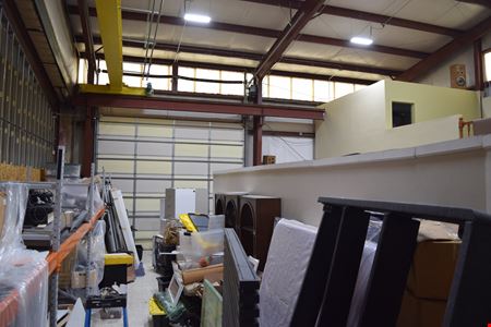 5,300 SF warehouse building w/ storage yard