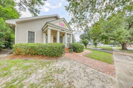 SALE OR LEASE:  Incredible commercial office building with additional development potential, a brief walk from all downtown Thomasville