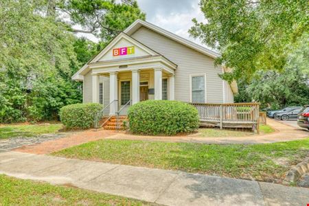 SALE OR LEASE:  Incredible commercial office building with additional development potential, a brief walk from all downtown Thomasville