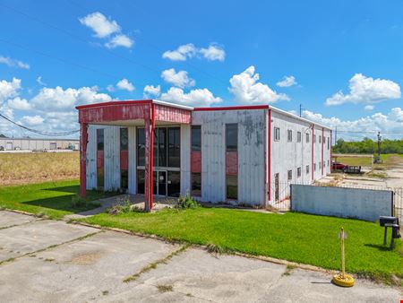 Dual Warehouses Near Hwy 90 with Surplus Land and Office