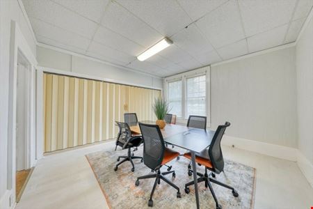 SALE OR LEASE:  Incredible commercial office building with additional development potential, a brief walk from all downtown Thomasville