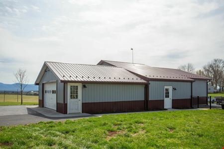 COUNTRY LIVING MEETS BUSINESS OPPORRUNITY ON 5+ ACRES