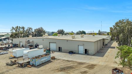 Freestanding Heavy Industrial Building w/ Office/Showroom on ±5 AC