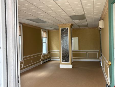For Sale: Mixed-Use Retail/Office + 4 Apartments
