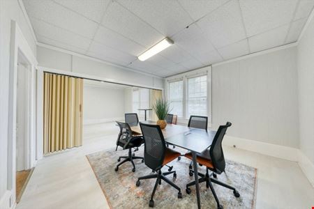 SALE OR LEASE:  Incredible commercial office building with additional development potential, a brief walk from all downtown Thomasville