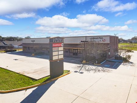 Retail space for Sale at Vacant Shopping Center - LaMarquis Plaza in Port Allen