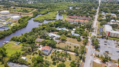 THE 1.04 ACRES OF MULTI-FAMILY LAND IMPROVED WITH SINGLE-FAMILY HOMES