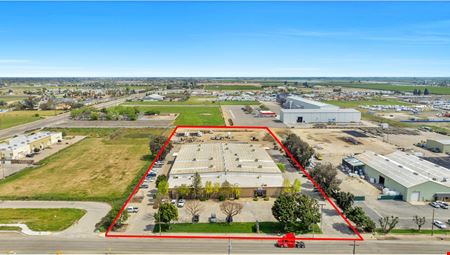 Freestanding Heavy Industrial Building w/ Office/Showroom on ±5 AC