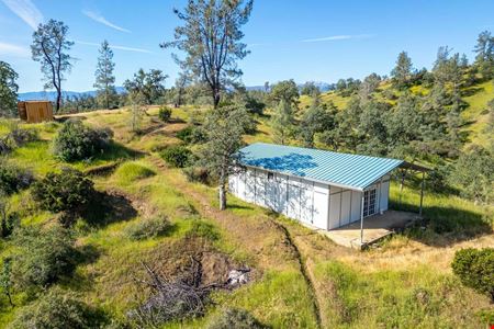 ±40.29 Acres of Level Land w/ ±1,400 SF of Structures