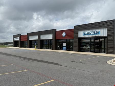 NEW RETAIL CENTER FOR SALE OR LEASE IN ROGERSVILLE