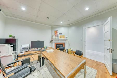 SALE OR LEASE:  Incredible commercial office building with additional development potential, a brief walk from all downtown Thomasville