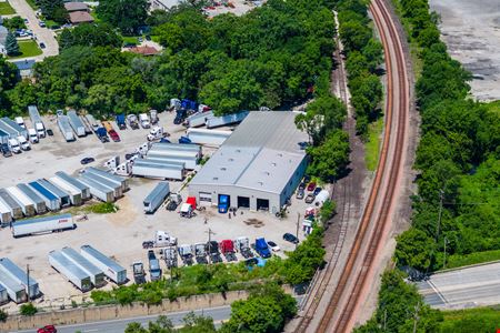 Industrial Facility with Office Space & Fleet Storage & 11.8± AC Dev. Site