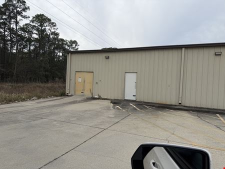 MULTI USE BUILDING ON CREOSOTE RD.