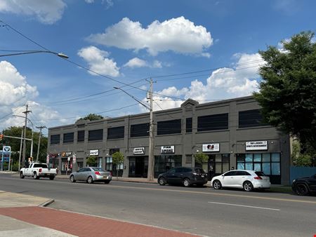 Syracuse Mixed-Use Corner Building – Retail Income + Residential Conversion