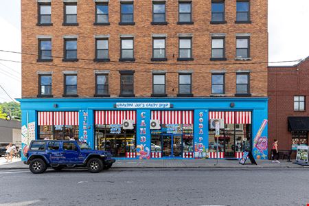 The American Wholesale Building | 37,500 SF Mixed-Use Investment Opportunity