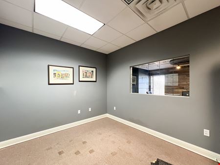 Office Warehouse w/ Rental Income Bordering Airport