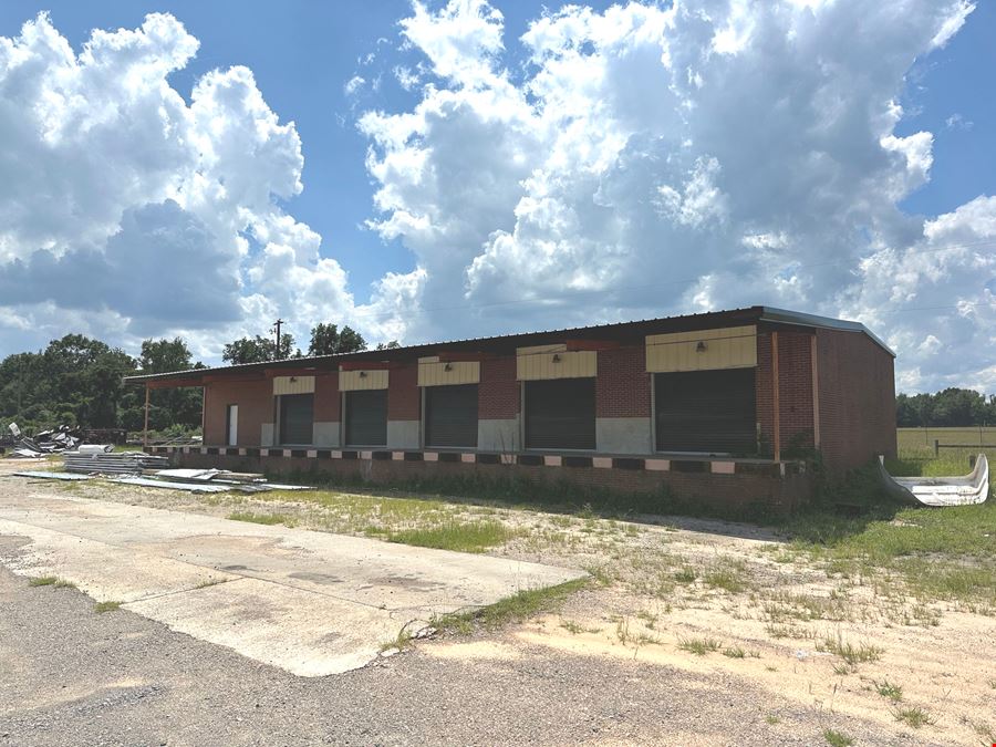 6.68 acres of Industrial Outdoor Storage (IOS) w/ Warehouse