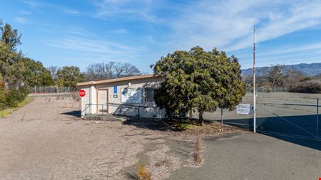 Industrial Property with Yard Space Near Freeway!