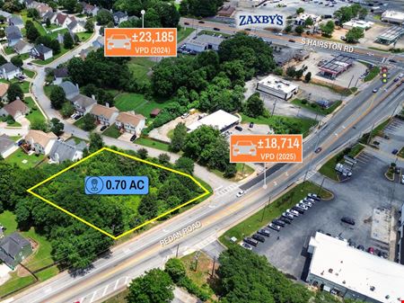 Land space for Sale at $1 Auction – 0.70 AC Hard Corner Parcel | 18K VPD | Atlanta MSA in Stone Mountain