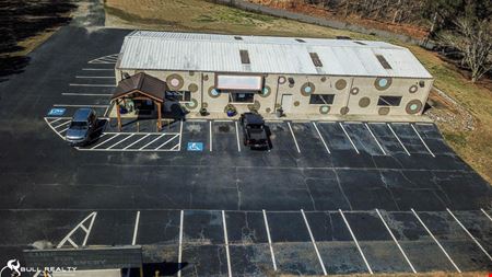 Single-Tenant Retail Building Accessible From GA-400  | ±4,000 | Sale Leaseback | NNN Lease
