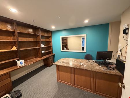 Freestanding ~ Income Producing Showroom / Warehouse