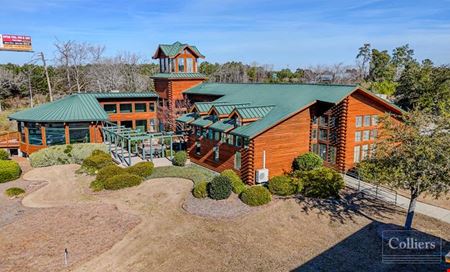 Office space for Sale at ±9,080-SF Southland Log Homes Building Available with Excellent I-26 Visibility | Irmo, SC in Irmo