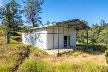 ±40.29 Acres of Level Land w/ ±1,400 SF of Structures