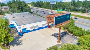 BrandSmart Warehouse (Vacant) & Billboard