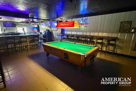 High-Visibility Freestanding Bar Property