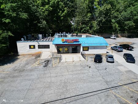 Income Producing Laundry Facility | ±4,408 SF | ±0.85 AC | Signalized Corner Development Site