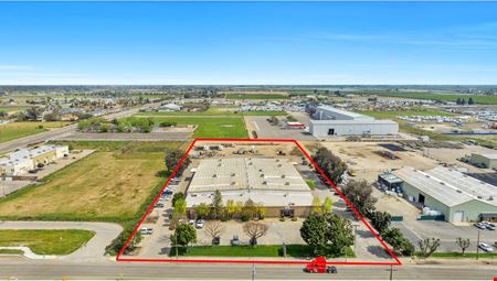 Freestanding Heavy Industrial Building w/ Office/Showroom on ±5 AC