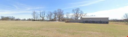 1.97 ACRES IN LOWELL, AR WITH SHOP AND HOME