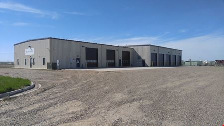 ±14,000 SF Industrial Shop | ±6.63 Fenced Yard | Williston ND