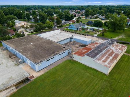 35,000+ SF Industrial Facility | 2.46 AC | Fenced Storage