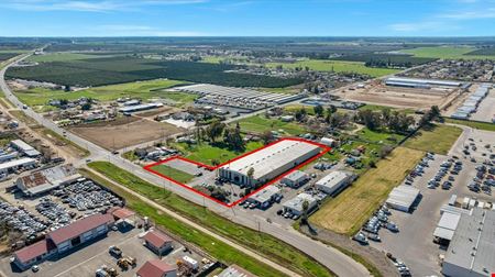 Freestanding Heavy Industrial Building w/ Office/Showroom on ±6.55 AC