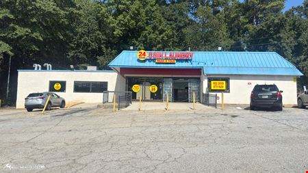 Income Producing Laundry Facility | ±4,408 SF | ±0.85 AC | Signalized Corner Development Site