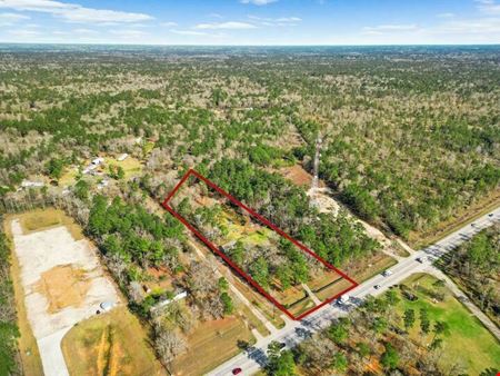 Commercial space at Prime 3-Acre Unrestricted Property Near Conroe – Ideal for Residential or Commercial Use! Just Outside City Limits in Conroe