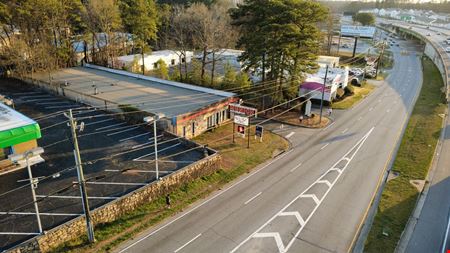 Freestanding Warehouse Building with Retail Exposure | ±7,500 SF | For Sale