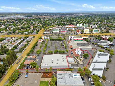 Value Add Strip Center with Cell Tower