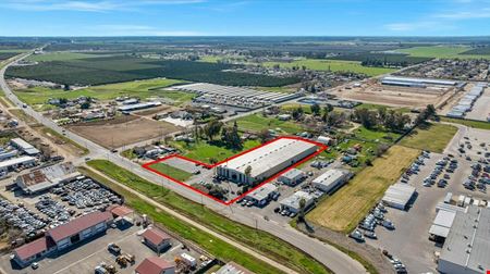 Freestanding Heavy Industrial Building w/ Office/Showroom on ±6.55 AC