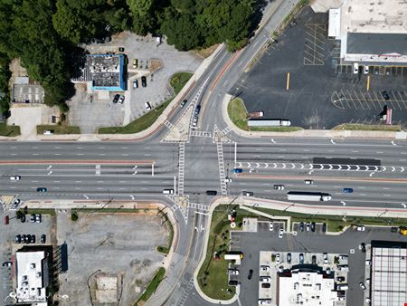 Income Producing Laundry Facility | ±4,408 SF | ±0.85 AC | Signalized Corner Development Site
