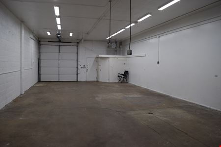 2,000 SF office warehouse unit with drive through 10'x10' doors