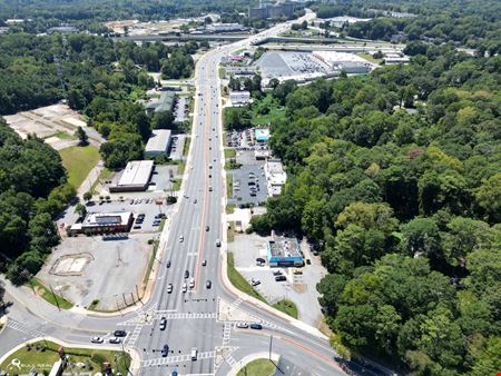 Income Producing Laundry Facility | ±4,408 SF | ±0.85 AC | Signalized Corner Development Site